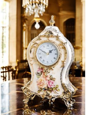 Table clock in refined ceramic, with elegant floral and golden details, handcrafted.