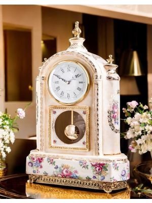 Refined ceramic pendulum clock, with elegant golden decorations, handcrafted.