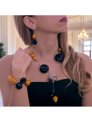 Venetian Refinement: Necklace, bracelet and earrings with real blown Murano glass beads.