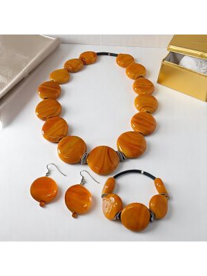 Refined set of handcrafted Murano glass jewelry, consisting of necklace, bracelet and earrings.