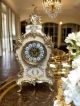 Fine ceramic table clock, decorated with golden details, handcrafted with artisan care.