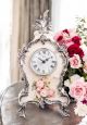 Table clock in fine ceramic, with refined silver details, handmade.