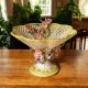 Ceramic artistic centerpiece, decorated with orchids and gold details, handmade
